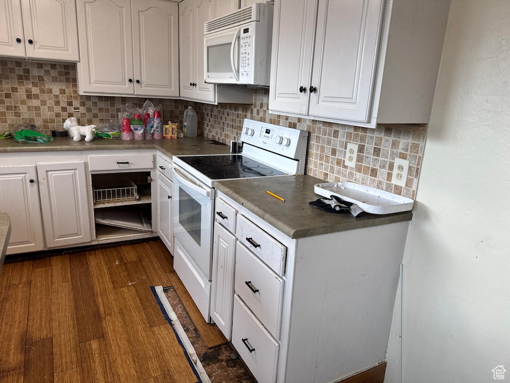810 E Maple St N, Mapleton, UT 84664 - kitchen featuring white cabinets, dark wood finished floors, decorative backsplash, and white appliances