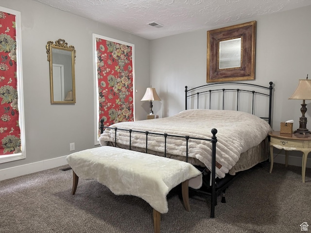95 E Continental Dr S Unit 61-G, Farmington, UT 84025 - carpeted bedroom with visible vents, baseboards, and a textured ceiling