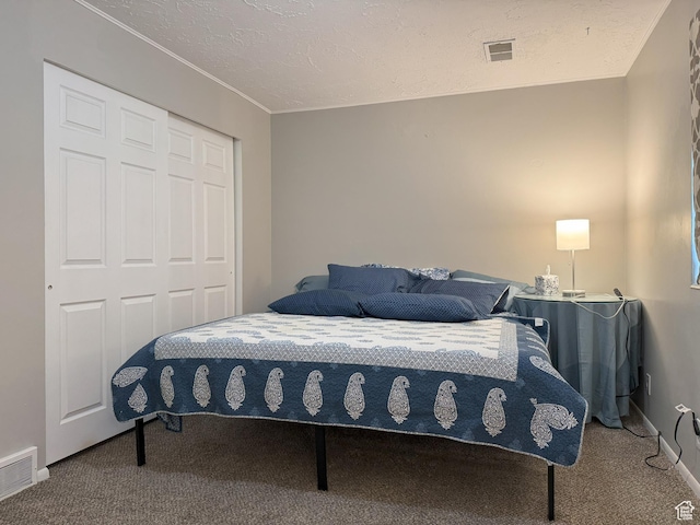 95 E Continental Dr S Unit 61-G, Farmington, UT 84025 - bedroom with visible vents, a closet, and carpet