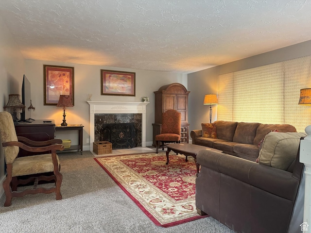 95 E Continental Dr S Unit 61-G, Farmington, UT 84025 - carpeted living area featuring a fireplace and a textured ceiling