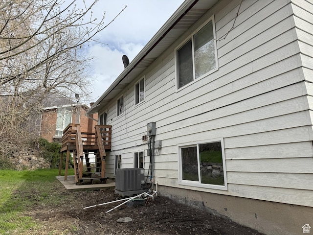 95 E Continental Dr S Unit 61-G, Farmington, UT 84025 - view of side of home with central AC and stairway