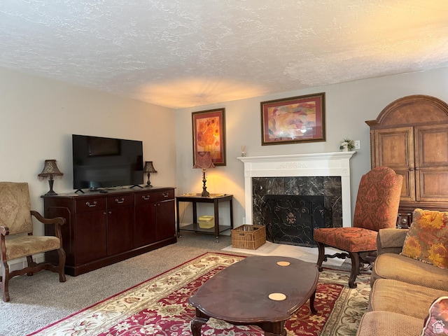 95 E Continental Dr S Unit 61-G, Farmington, UT 84025 - living room featuring a textured ceiling, a premium fireplace, and light colored carpet
