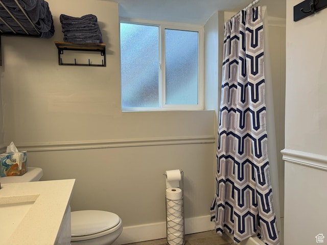 95 E Continental Dr S Unit 61-G, Farmington, UT 84025 - full bathroom with baseboards, curtained shower, toilet, and vanity