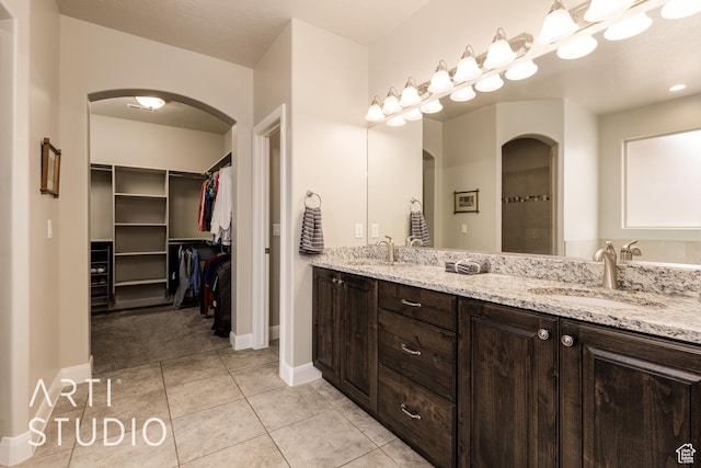 2691 E 3800 S, St George, UT 84790 - full bathroom with a spacious closet, a sink, tile patterned flooring, and double vanity
