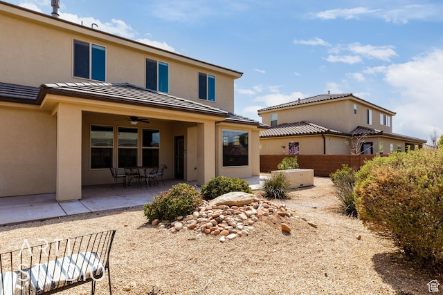 2691 E 3800 S, St George, UT 84790 - rear view of property with a tile roof, stucco siding, fence, and a patio