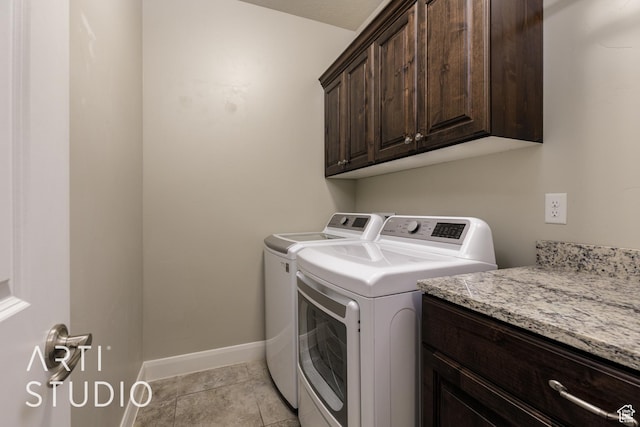 2691 E 3800 S, St George, UT 84790 - laundry room featuring light tile patterned floors, cabinet space, baseboards, and washer and clothes dryer
