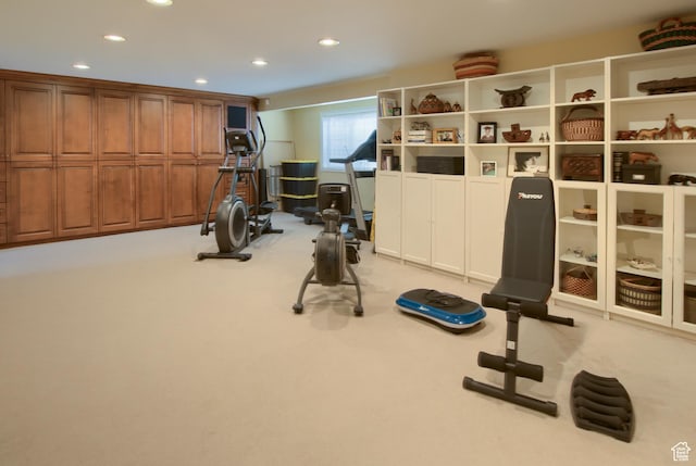 workout room with carpet floors and recessed lighting