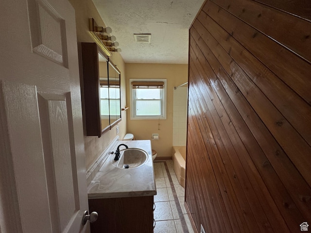 26 Sylvia Dr N, South Ogden, UT 84405 - full bathroom featuring shower / washtub combination, a textured ceiling, vanity, visible vents, and toilet