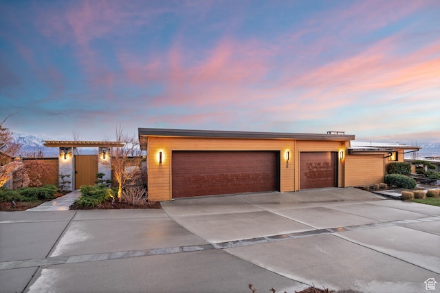 828 E Northcrest Dr, Salt Lake City, UT 84103 - view of front of house with concrete driveway and a garage