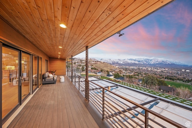 828 E Northcrest Dr, Salt Lake City, UT 84103 - deck at dusk with a mountain view