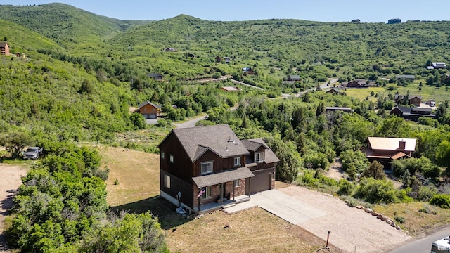 8374 E Lake Pines Dr Unit 269, Heber City, UT 84032 - view of subject property featuring a heavily wooded area and a mountainous background