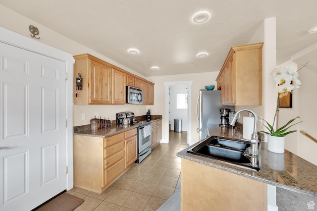 8374 E Lake Pines Dr Unit 269, Heber City, UT 84032 - kitchen with a sink, light brown cabinets, appliances with stainless steel finishes, and light tile patterned flooring