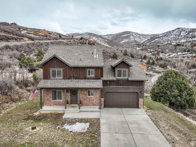 8374 E Lake Pines Dr Unit 269, Heber City, UT 84032 - view of front of property with a mountain view, concrete driveway, and roof with shingles
