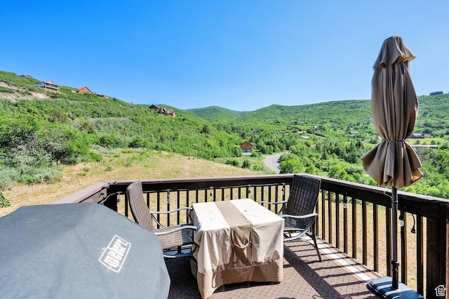 8374 E Lake Pines Dr Unit 269, Heber City, UT 84032 - wooden deck with a grill and outdoor dining space