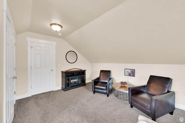 8374 E Lake Pines Dr Unit 269, Heber City, UT 84032 - sitting room featuring baseboards, carpet flooring, lofted ceiling, and a fireplace