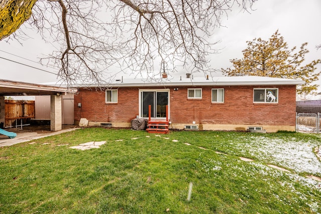 30 N 1300 E, Springville, UT 84663 - rear view of house with a lawn, brick siding, fence, and entry steps
