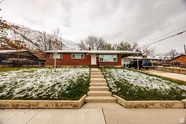 30 N 1300 E, Springville, UT 84663 - view of front of property with driveway, a carport, fence, and brick siding