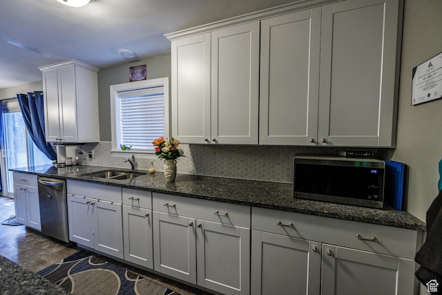 30 N 1300 E, Springville, UT 84663 - kitchen featuring a sink, white cabinetry, appliances with stainless steel finishes, decorative backsplash, and dark stone counters