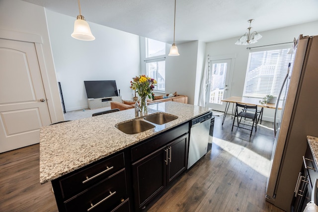 3951 W 1450 N Unit 269, Lehi, UT 84043 - kitchen featuring a wealth of natural light, an island with sink, a sink, appliances with stainless steel finishes, and dark wood-style floors