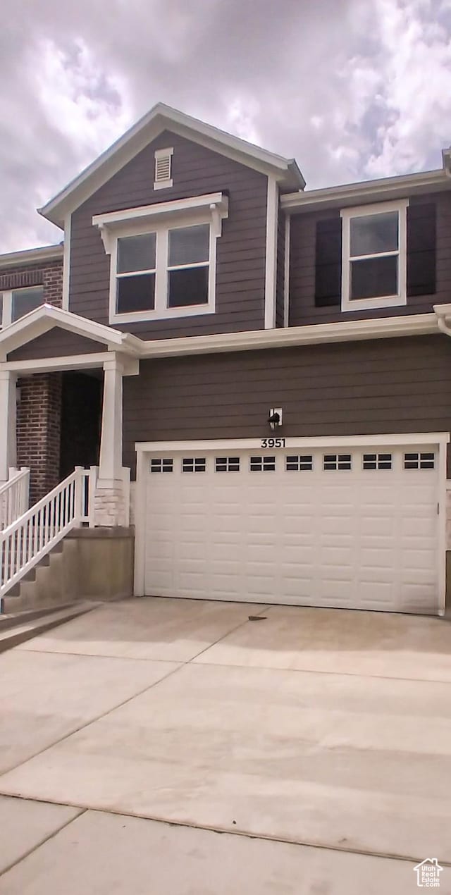 3951 W 1450 N Unit 269, Lehi, UT 84043 - view of front facade with driveway and a garage