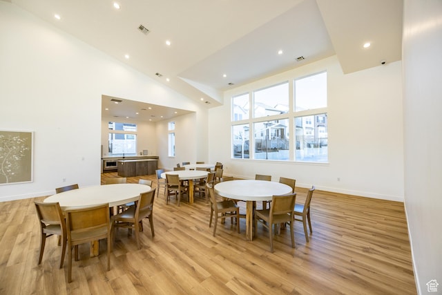 3951 W 1450 N Unit 269, Lehi, UT 84043 - dining space with a high ceiling, visible vents, recessed lighting, and light wood-type flooring