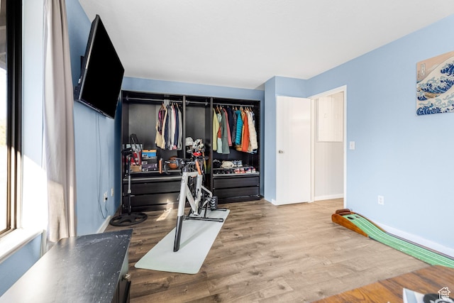 4667 S Black Swan Dr, Millcreek, UT 84117 - bedroom featuring wood finished floors and baseboards