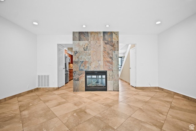 4667 S Black Swan Dr, Millcreek, UT 84117 - unfurnished living room featuring recessed lighting and a multi sided fireplace