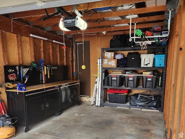 4667 S Black Swan Dr, Millcreek, UT 84117 - garage featuring a garage door opener