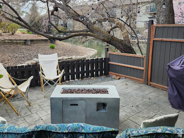4667 S Black Swan Dr, Millcreek, UT 84117 - view of patio with fence and an outdoor fire pit