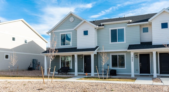 1088 E Propeller Row, Saratoga Springs, UT 84045 - view of front of property with covered porch and a shingled roof