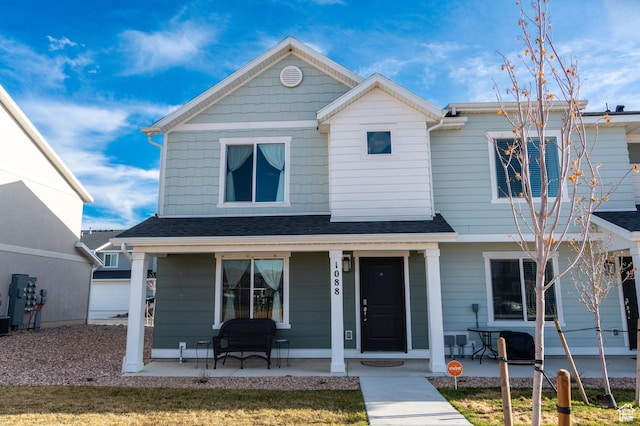 view of front of property featuring covered porch