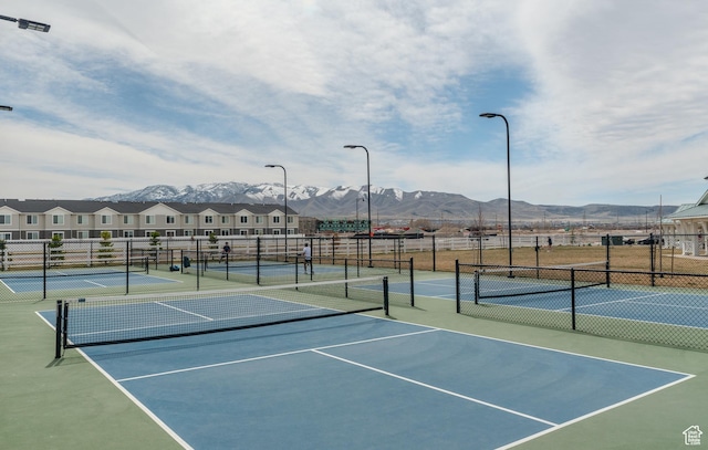 1088 E Propeller Row, Saratoga Springs, UT 84045 - view of sport court featuring a residential view, a mountain view, and fence