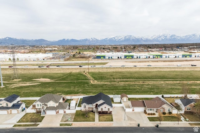 bird's eye view featuring a residential view and a mountain view