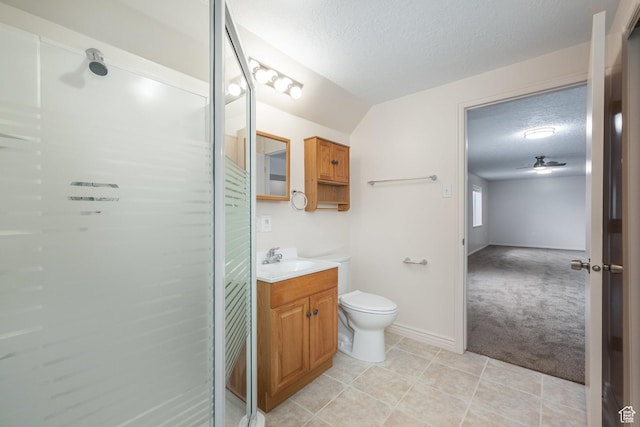full bath with tile patterned floors, vanity, a textured ceiling, and a shower stall