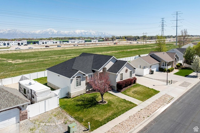 drone / aerial view with a mountain view and a residential view
