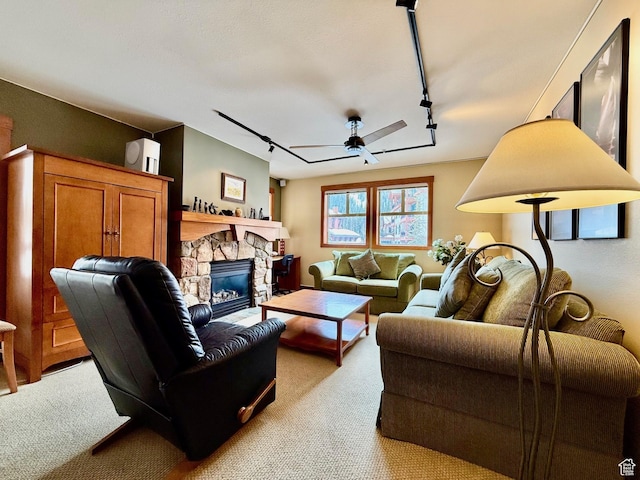 12080 E Big Cottonwood Rd Unit 214, Brighton, UT 84121 - living area with track lighting, a ceiling fan, carpet, and a fireplace