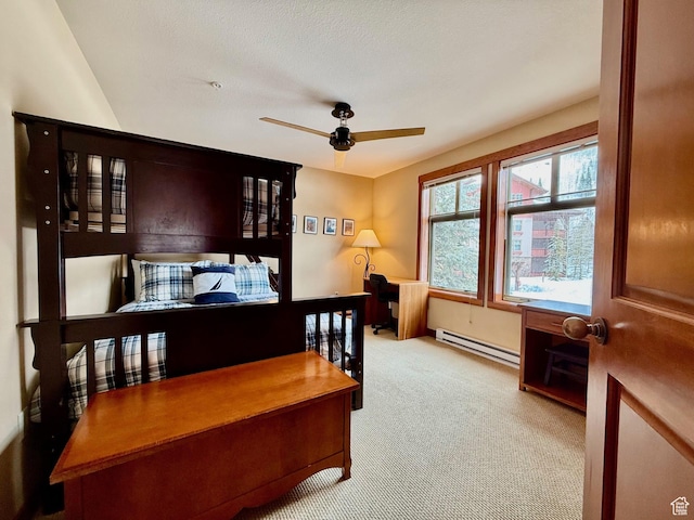 12080 E Big Cottonwood Rd Unit 214, Brighton, UT 84121 - bedroom with baseboard heating, carpet floors, and a ceiling fan