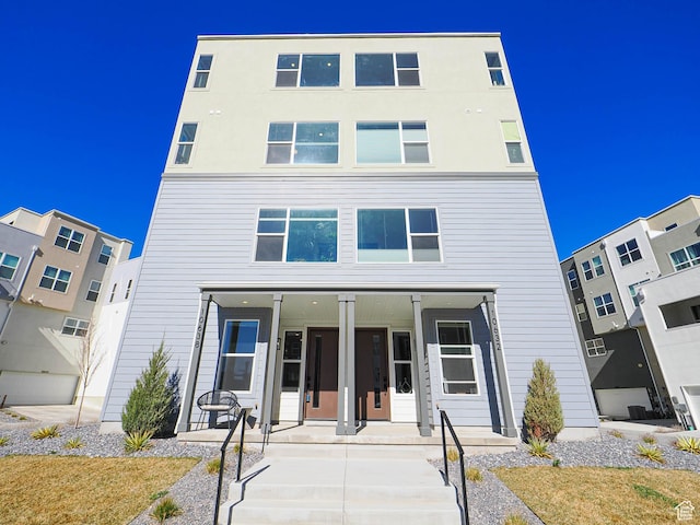 10638 S Pipestone Way W Unit 136, South Jordan, UT 84009 - view of property with a porch