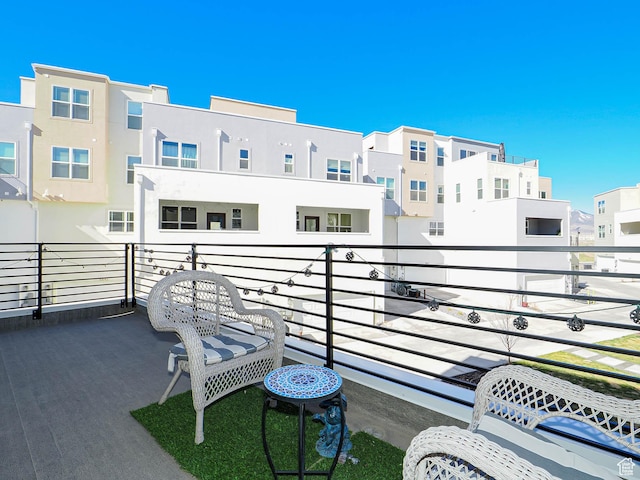 10638 S Pipestone Way W Unit 136, South Jordan, UT 84009 - view of patio / terrace with a balcony and a residential view