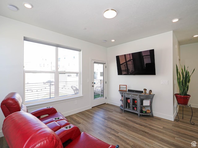 10638 S Pipestone Way W Unit 136, South Jordan, UT 84009 - living area featuring wood finished floors, baseboards, and recessed lighting