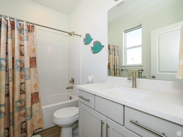 10638 S Pipestone Way W Unit 136, South Jordan, UT 84009 - full bath featuring vanity, toilet, shower / bath combination with curtain, and wood finished floors