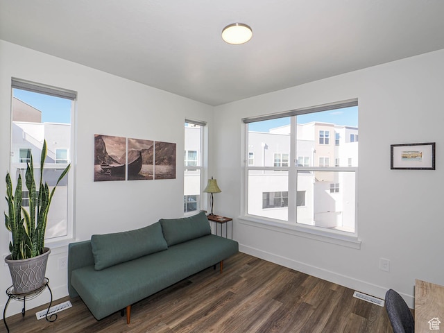 10638 S Pipestone Way W Unit 136, South Jordan, UT 84009 - sitting room with dark wood finished floors, healthy amount of natural light, and baseboards