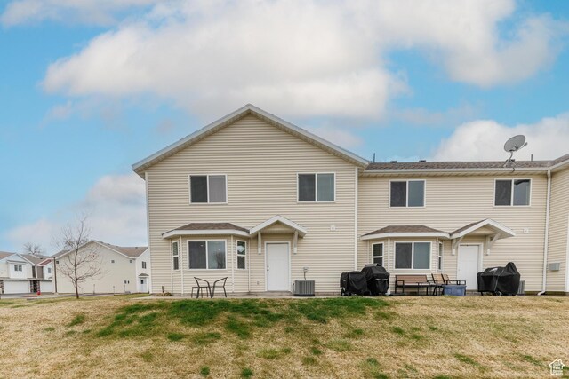51 N 270 W, Hyrum, UT 84319 - rear view of property with a lawn, cooling unit, and a patio
