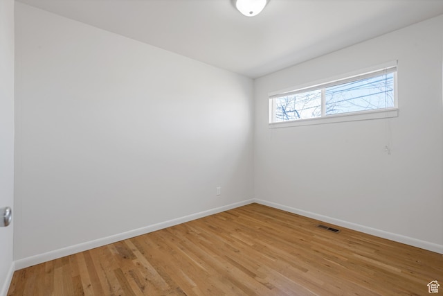 650 N 300 W Unit 231, Salt Lake City, UT 84103 - unfurnished room with baseboards, visible vents, and light wood-style flooring