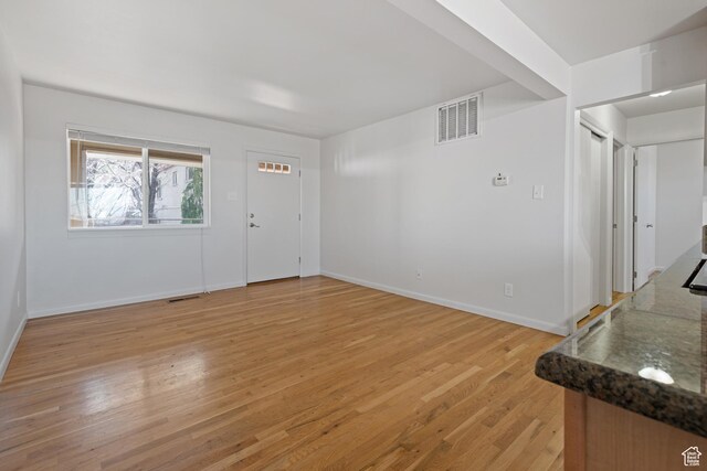 650 N 300 W Unit 231, Salt Lake City, UT 84103 - entryway featuring baseboards, light wood-style flooring, and visible vents