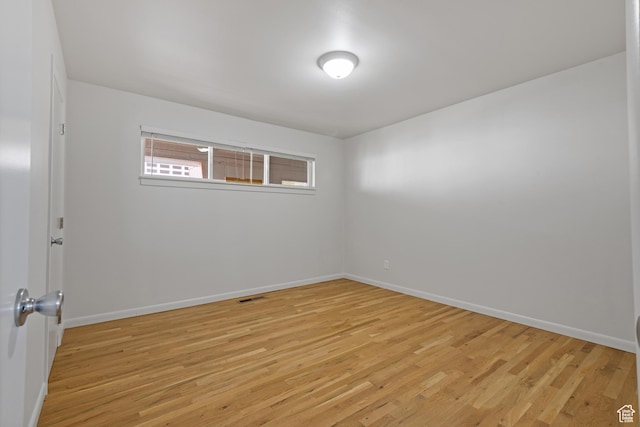 650 N 300 W Unit 231, Salt Lake City, UT 84103 - empty room with baseboards and light wood finished floors