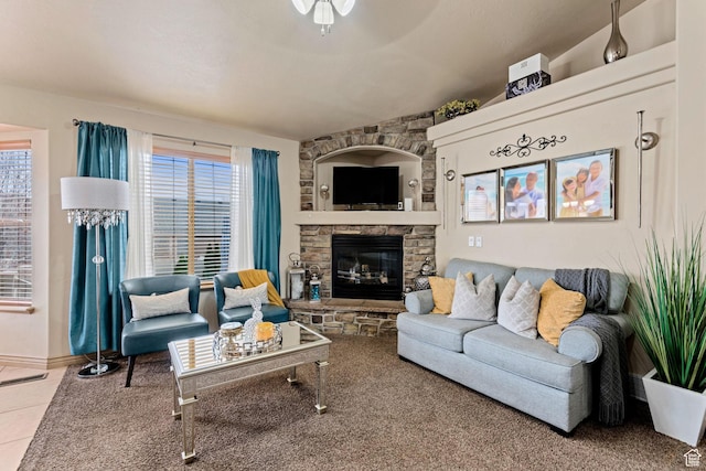 7989 S Bury Rd, West Jordan, UT 84081 - living area with tile patterned floors, baseboards, and a fireplace