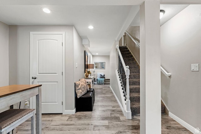 7989 S Bury Rd, West Jordan, UT 84081 - foyer entrance featuring light wood-style floors, baseboards, stairway, and recessed lighting