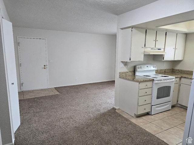 1039 E Quail Vista Ln Unit A, Millcreek, UT 84117 - kitchen with a textured ceiling, under cabinet range hood, white range with electric cooktop, light tile patterned floors, and light colored carpet