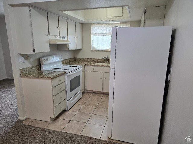 1039 E Quail Vista Ln Unit A, Millcreek, UT 84117 - kitchen with a sink, under cabinet range hood, light tile patterned floors, white appliances, and white cabinets